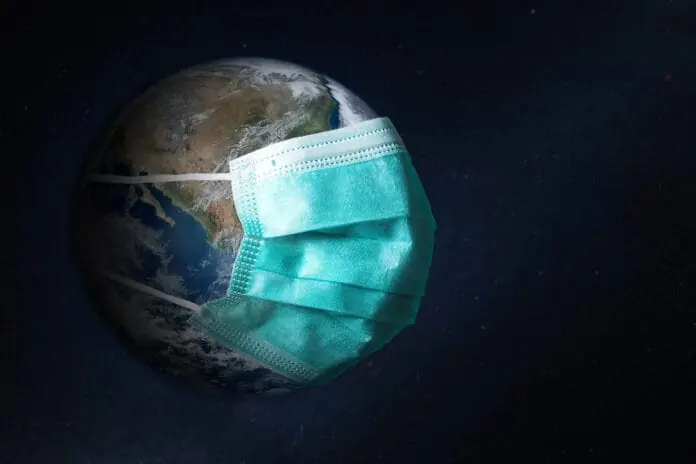 Planet Earth wearing a surgical face mask in space.